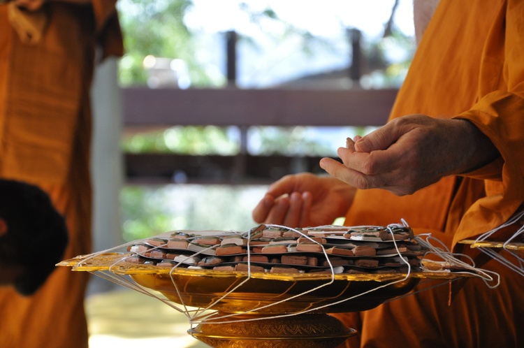 handing out amulets